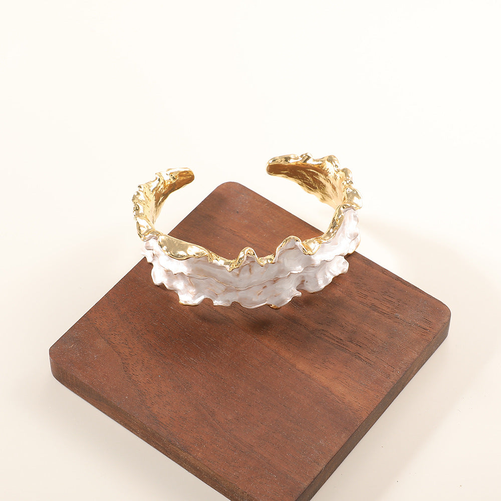 Women's bracelet with intricate flower design Tom Cottons