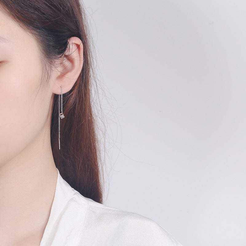 Women's earrings with elegant square pendant and shimmering zirconia Tom Cottons