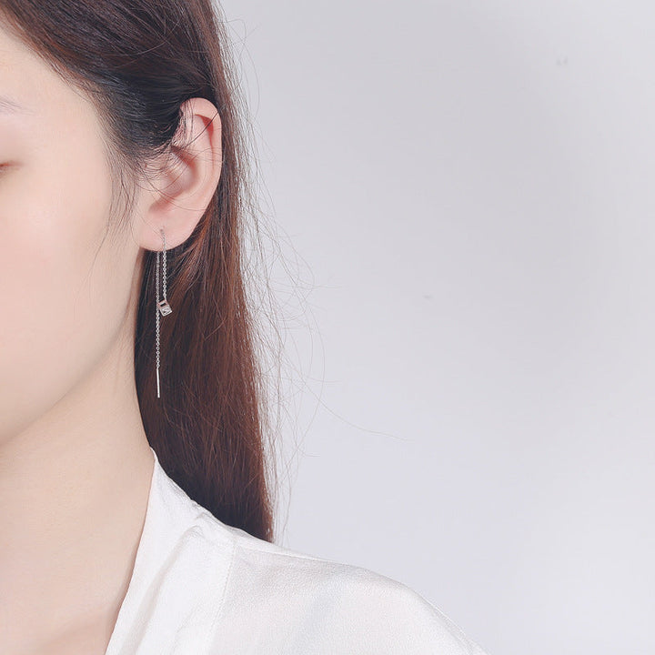 Women's earrings with elegant square pendant and shimmering zirconia Tom Cottons