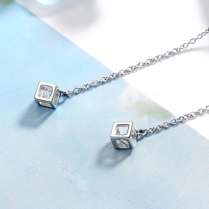 Women's earrings with elegant square pendant and shimmering zirconia Tom Cottons