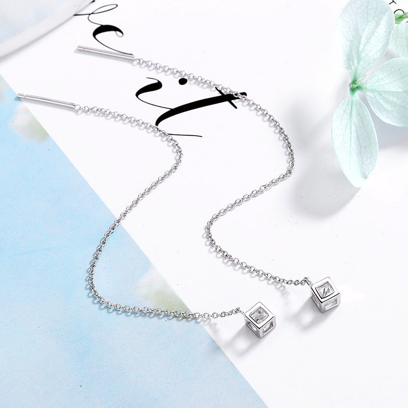 Women's earrings with elegant square pendant and shimmering zirconia Tom Cottons