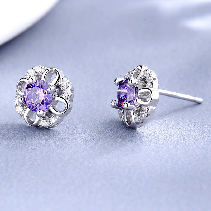Women's stud earrings with delicate flower design and sparkling crystals Tom Cottons