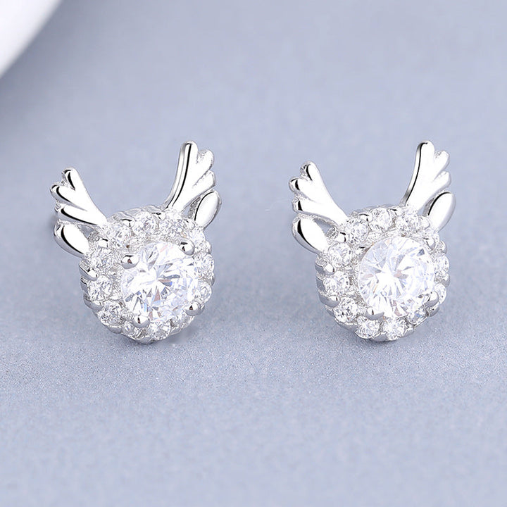 Women's earrings with sparkling crystals and playfully designed wings Tom Cottons