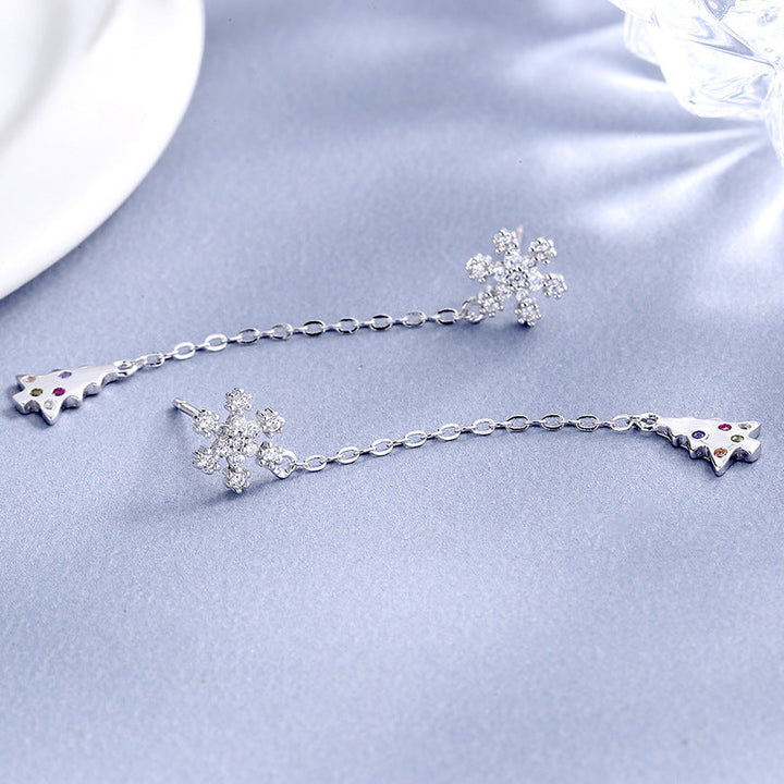 Women’s earrings with sparkling snowflake pendant and chain embellishment Tom Cottons
