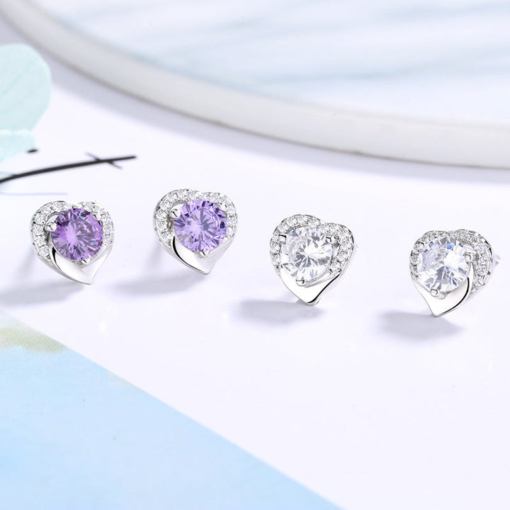 Women's earrings in heart-shaped design with sparkling zirconia Tom Cottons