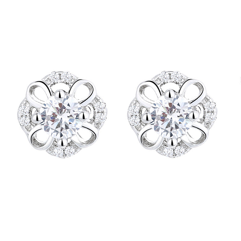 Women's stud earrings with delicate flower design and sparkling crystals Tom Cottons