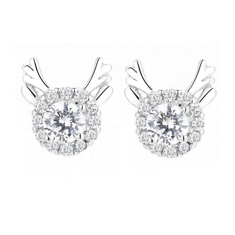 Women's earrings with sparkling crystals and playfully designed wings Tom Cottons