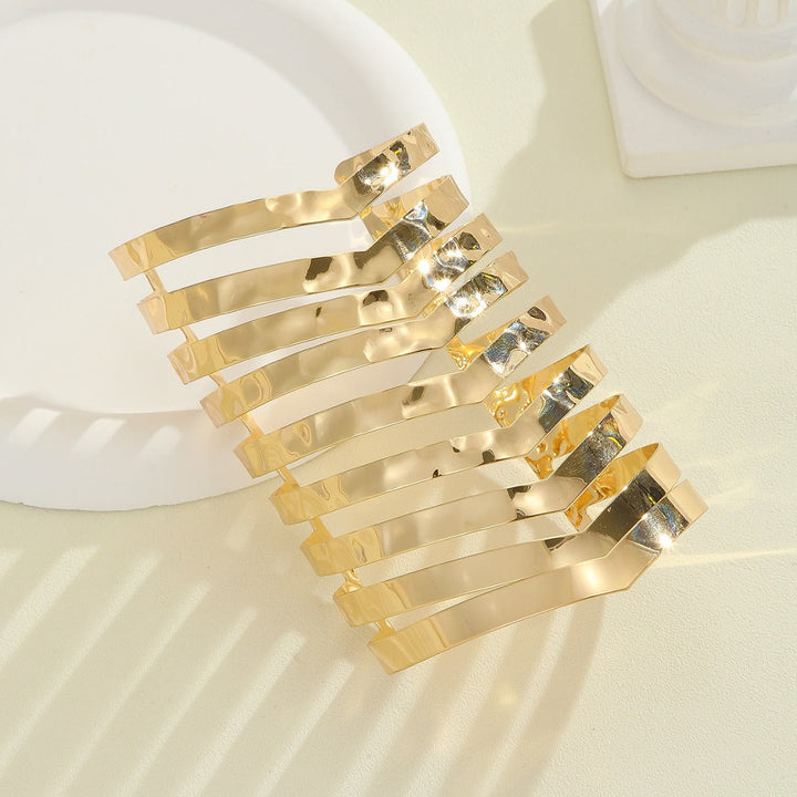 Women's hair accessories with shiny, curved elements Tom Cottons