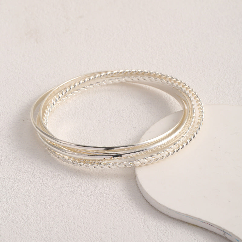 Women's bangle set with elaborate, braided and simple designs Tom Cottons