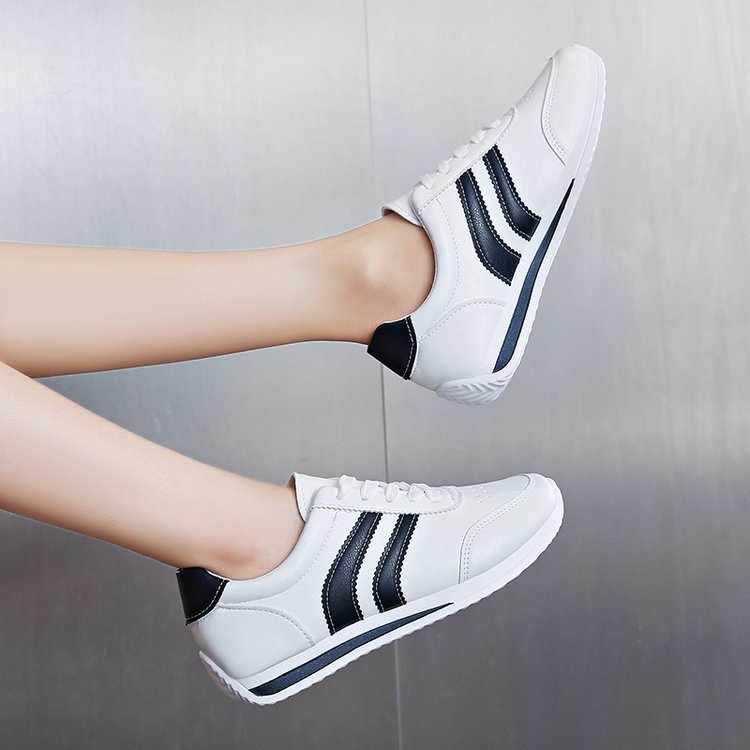 Women classic sneakers with stylish stripes
