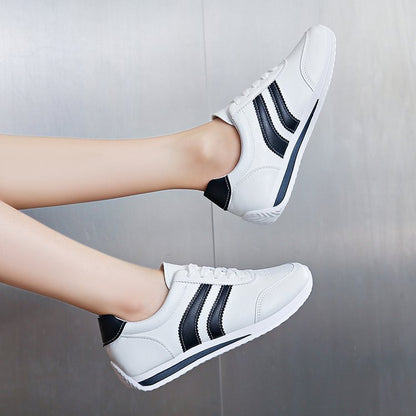Women classic sneakers with stylish stripes