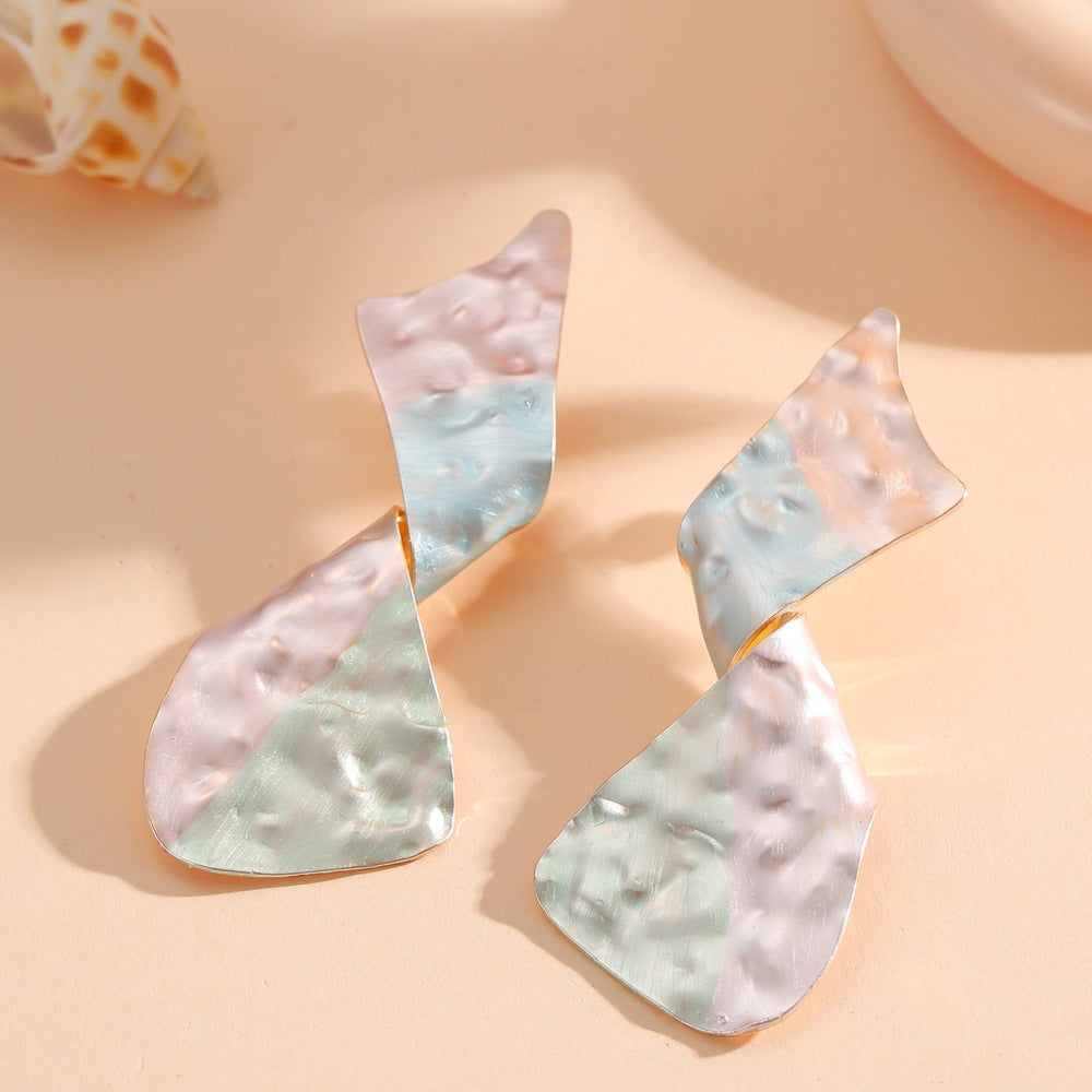 Ladies earrings in modern disc design Tom Cottons