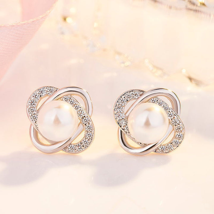 Ladies earrings with artistic pearl design and sparkling zirconia Tom Cottons
