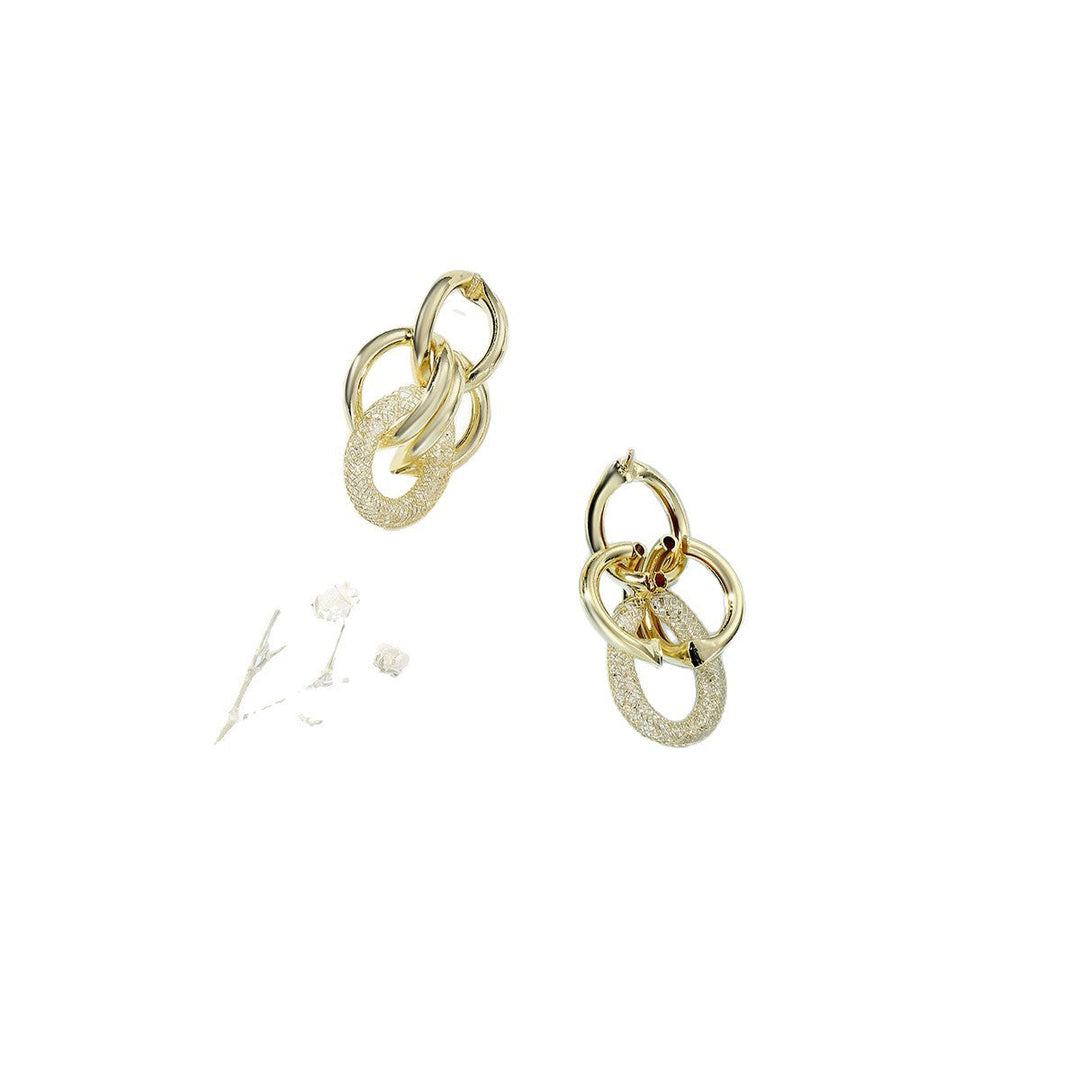 Women's Hanging Earrings with Luxurious, Sculptural Design Tom Cottons