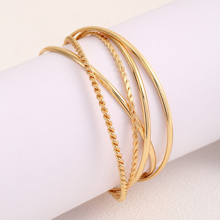 Women's bangle set with elaborate, braided and simple designs Tom Cottons