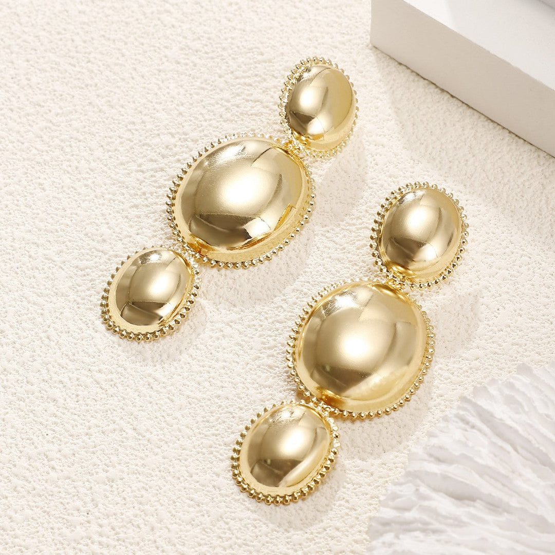 Women's earrings in artistic, structured design Tom Cottons