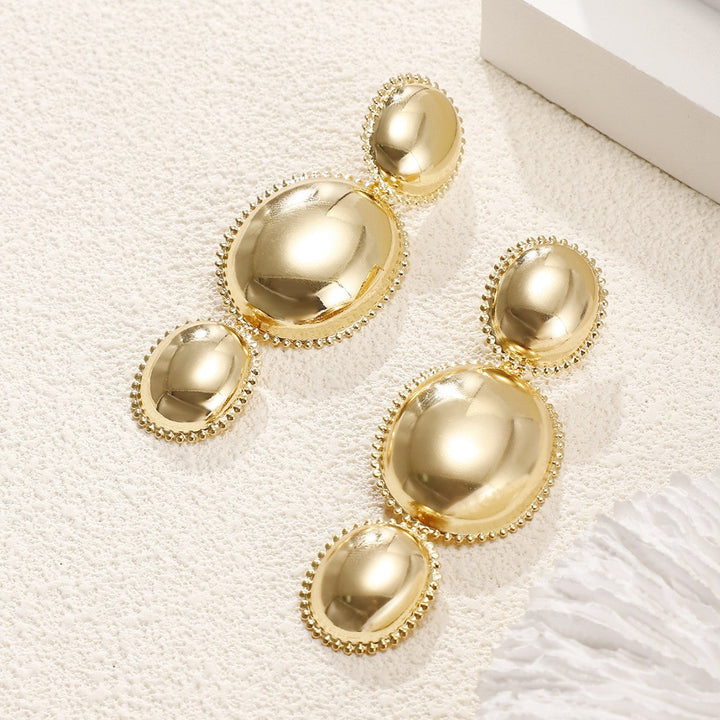 Women's earrings in artistic, structured design Tom Cottons