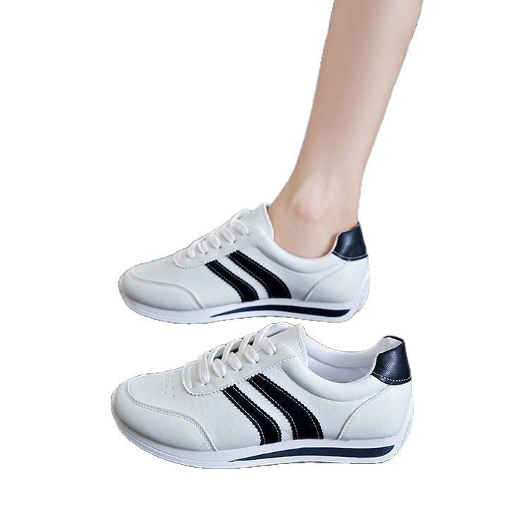 Women classic sneakers with stylish stripes