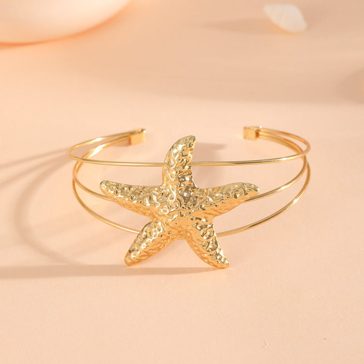 Women's bracelet with intricate bow design Tom Cottons