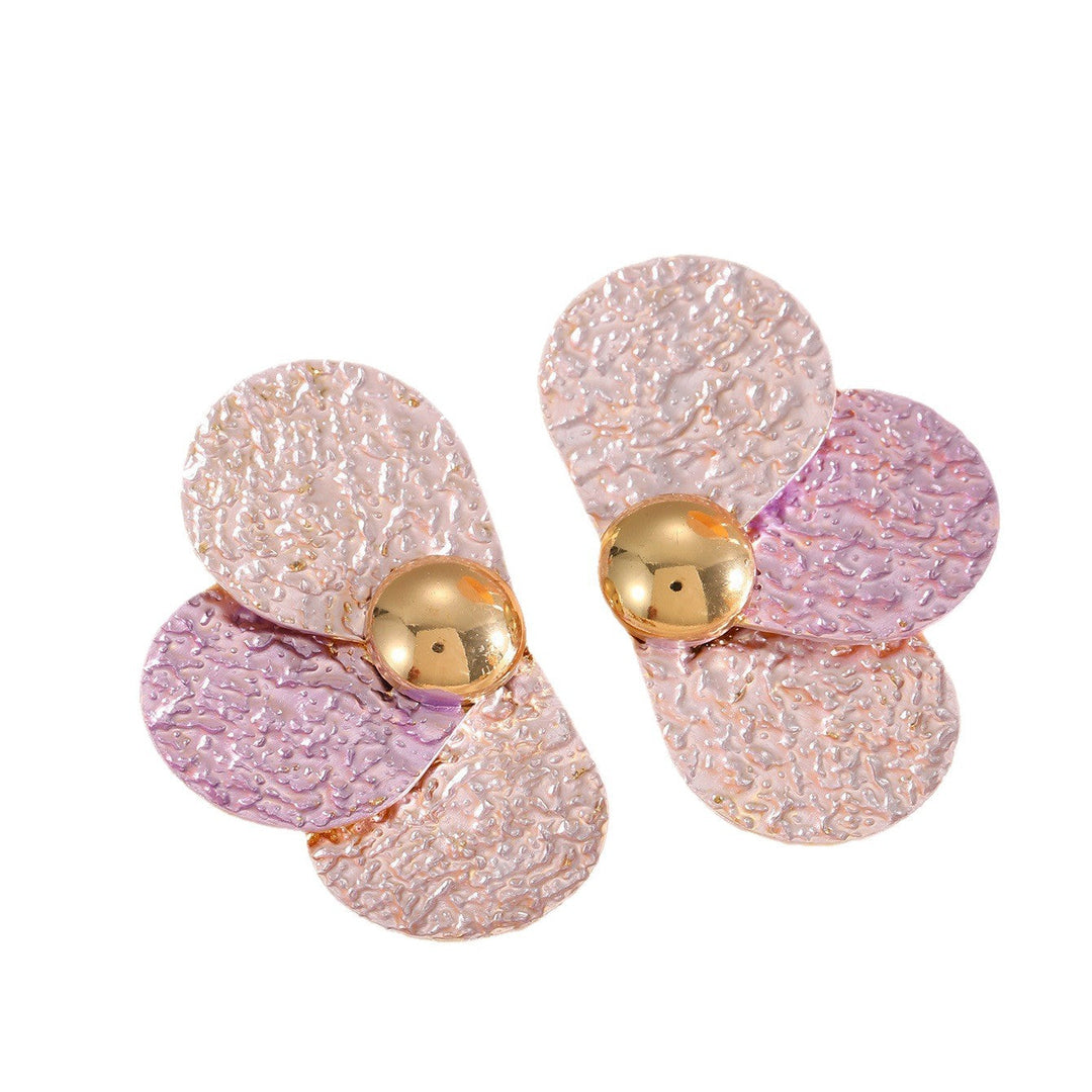 Women's ear clips in elaborate floral pattern Tom Cottons