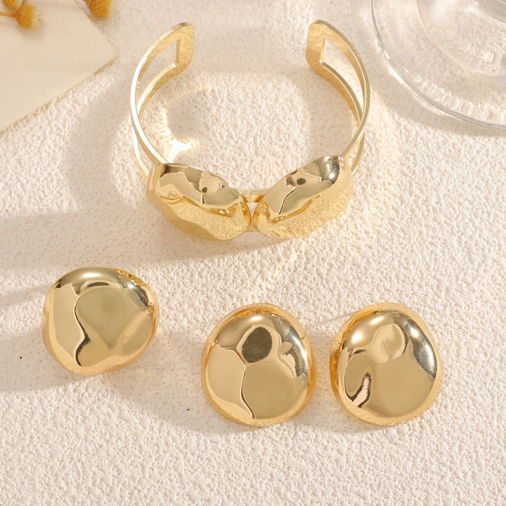 Ladies Open Cuff Bracelet with Elegant, Curved Design Tom Cottons