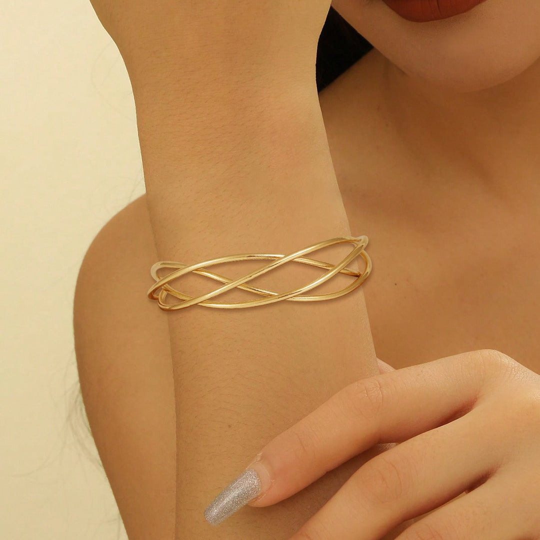 Ladies' bangle with elegant curved design Tom Cottons