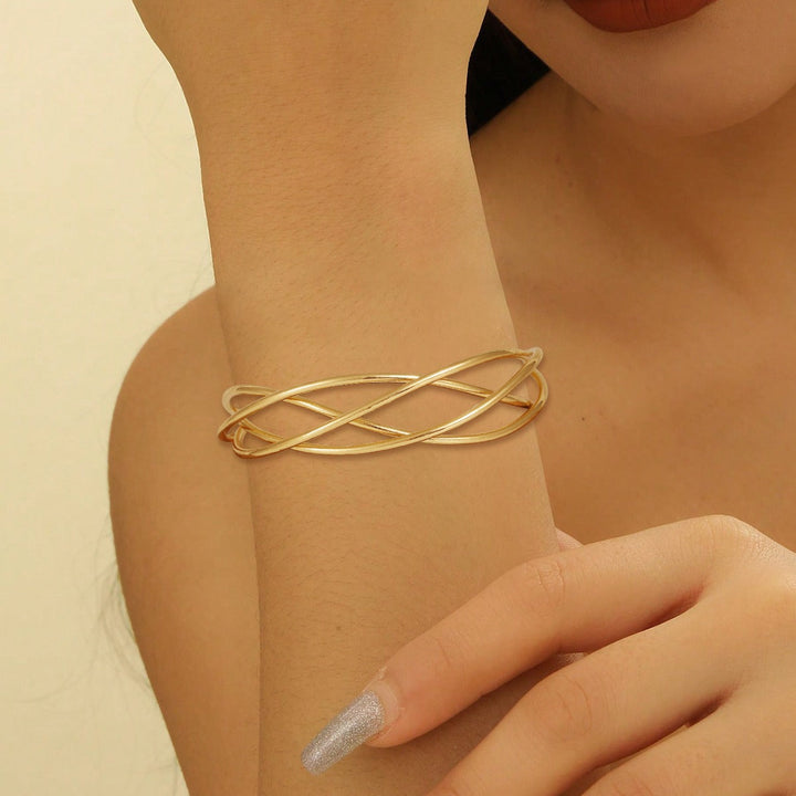 Ladies' bangle with elegant curved design Tom Cottons
