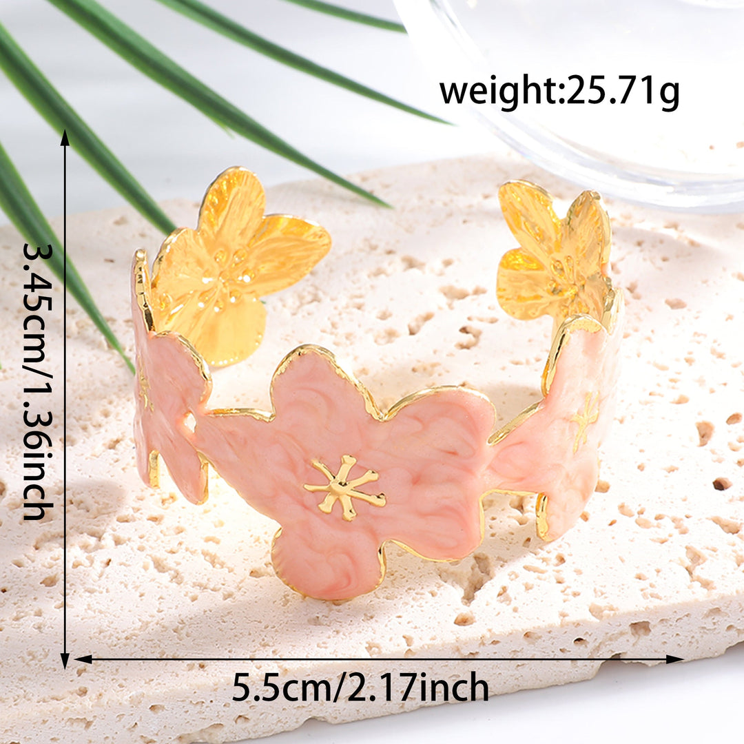 Ladies' bangle with floral motifs Tom Cottons