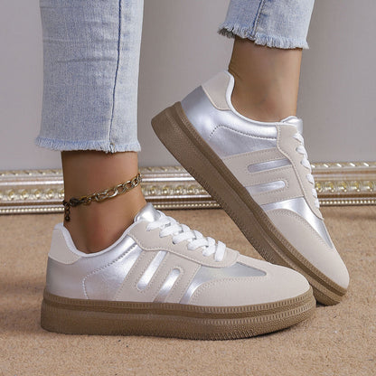 Women’s sporty sneakers with satin-finish upper material and retro design