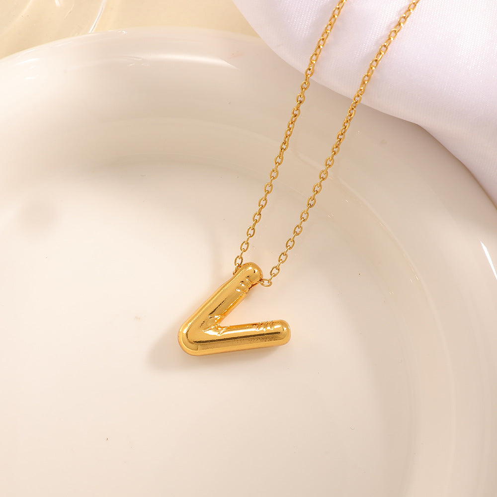Women's necklace with curved letter pendant Tom Cottons