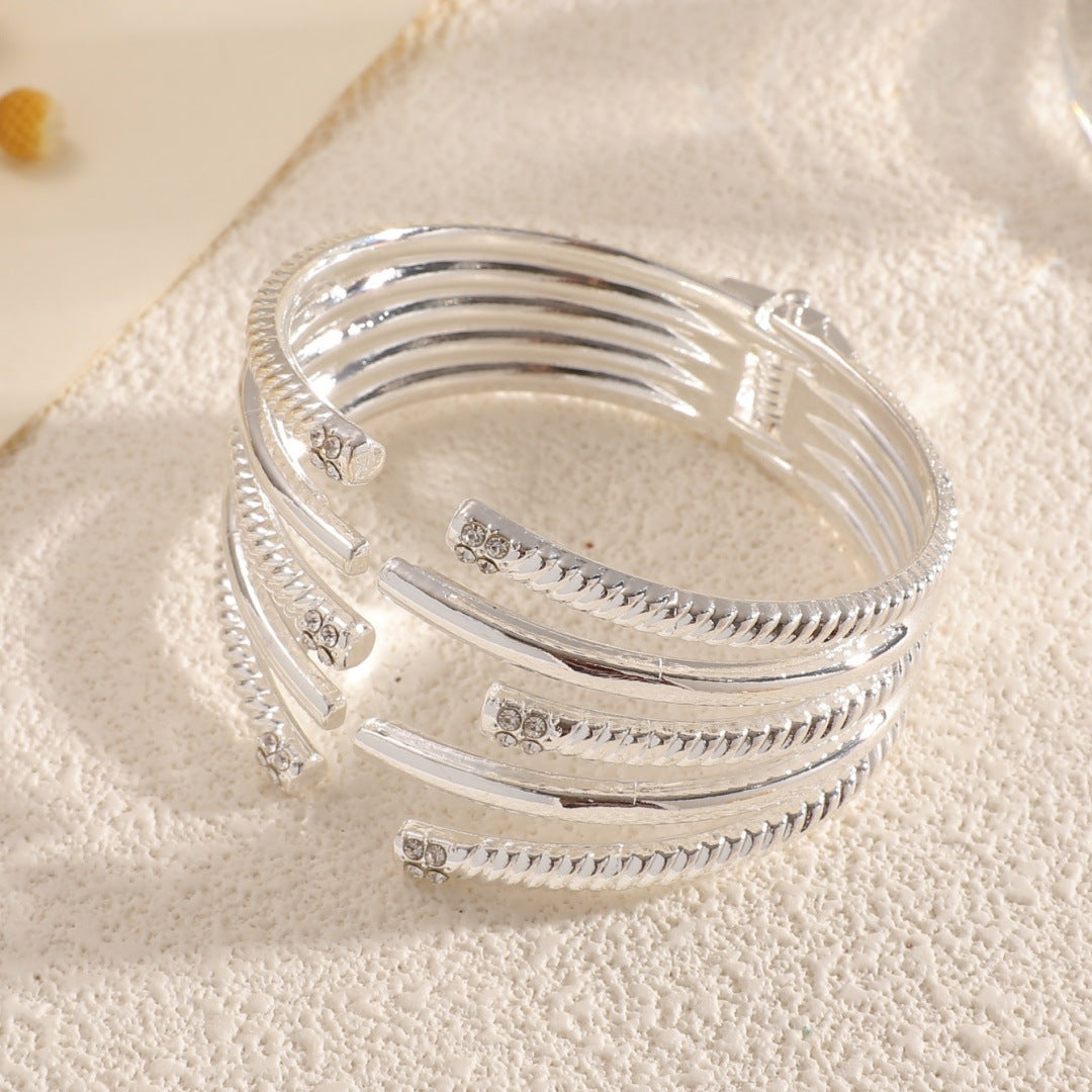 Women's Open Bangle with Modern, Layered Design Tom Cottons
