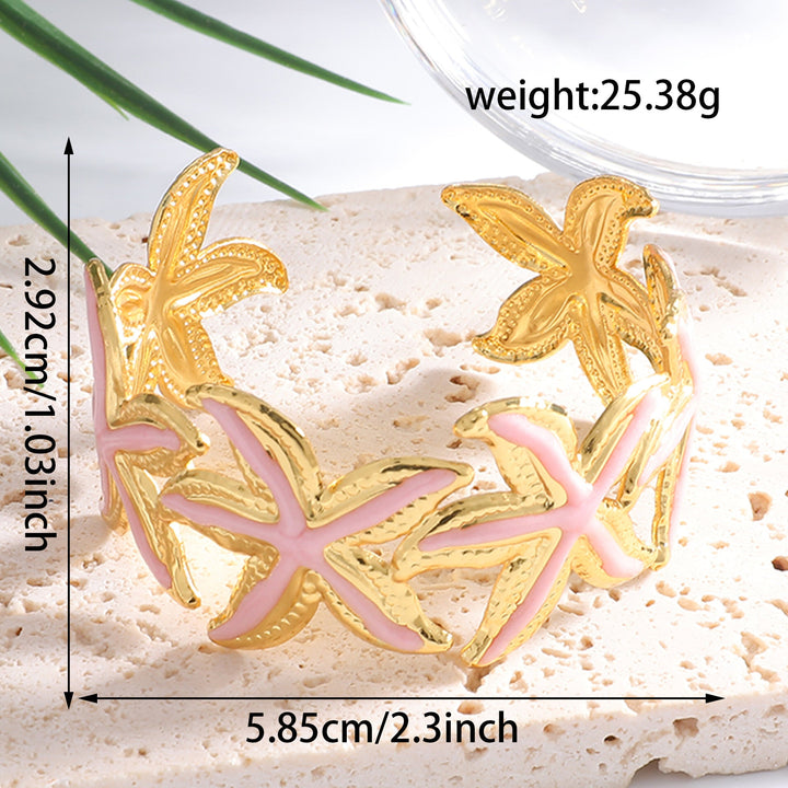 Ladies Open Cuff Bracelet with Expressive Star Motif Tom Cottons