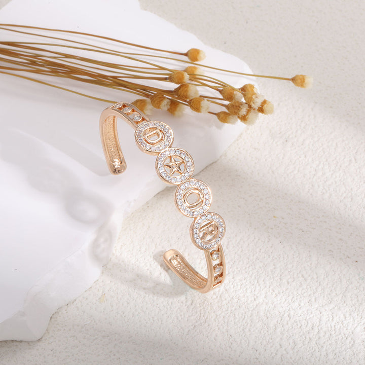 Ladies bracelet with elaborate infinity symbol and sparkling zirconia Tom Cottons