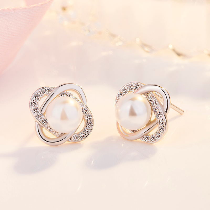 Ladies earrings with artistic pearl design and sparkling zirconia Tom Cottons