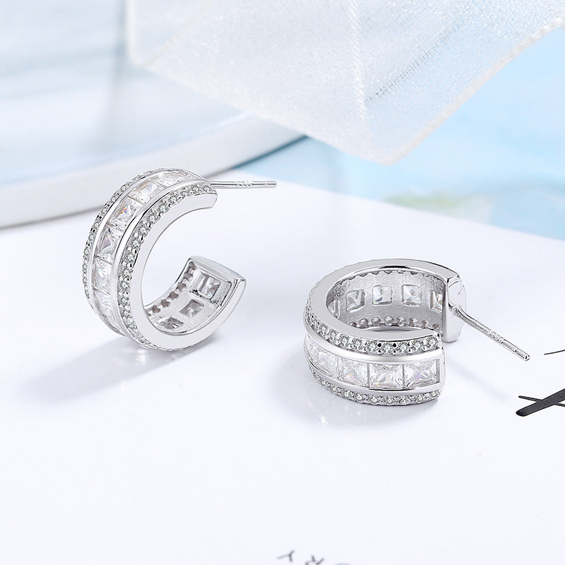 Women's stud earrings with elegant crystal and zirconia embellishment Tom Cottons