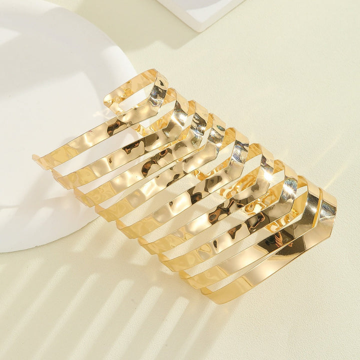 Women's hair accessories with shiny, curved elements Tom Cottons