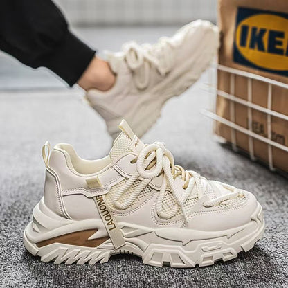 Women's sporty sneakers with a robust profile and breathable upper material