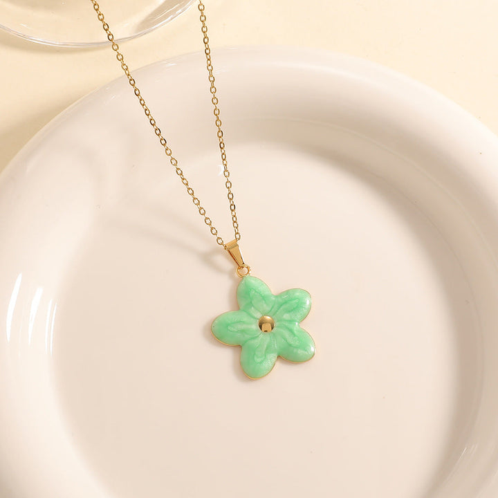 Women’s necklace with elaborately designed flower pendant Tom Cottons