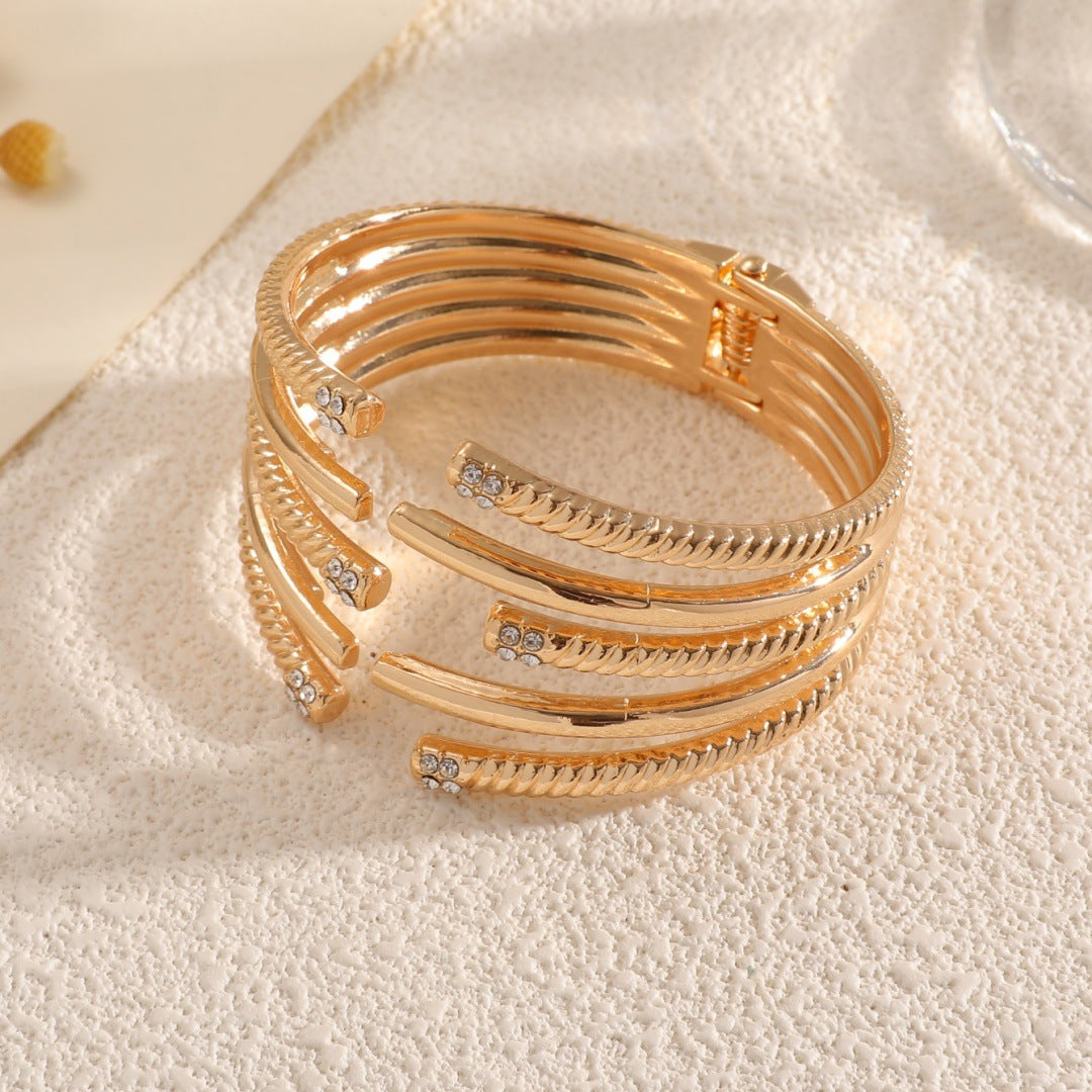 Women's Open Bangle with Modern, Layered Design Tom Cottons