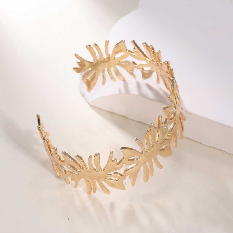 Women's Open Bangle with Elegant Wave Design Tom Cottons