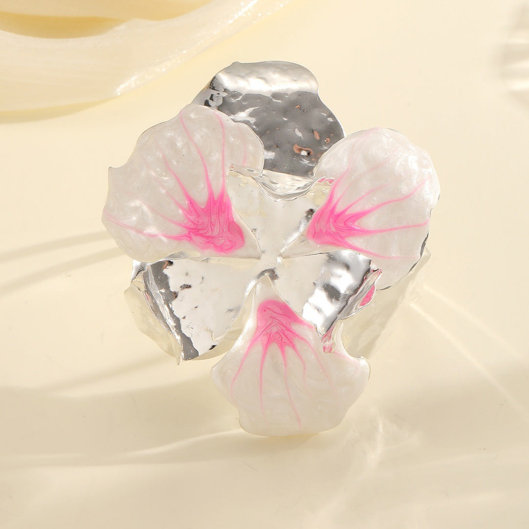 Women's flower-shaped ring made of shiny metal and high-quality epoxy resin Tom Cottons