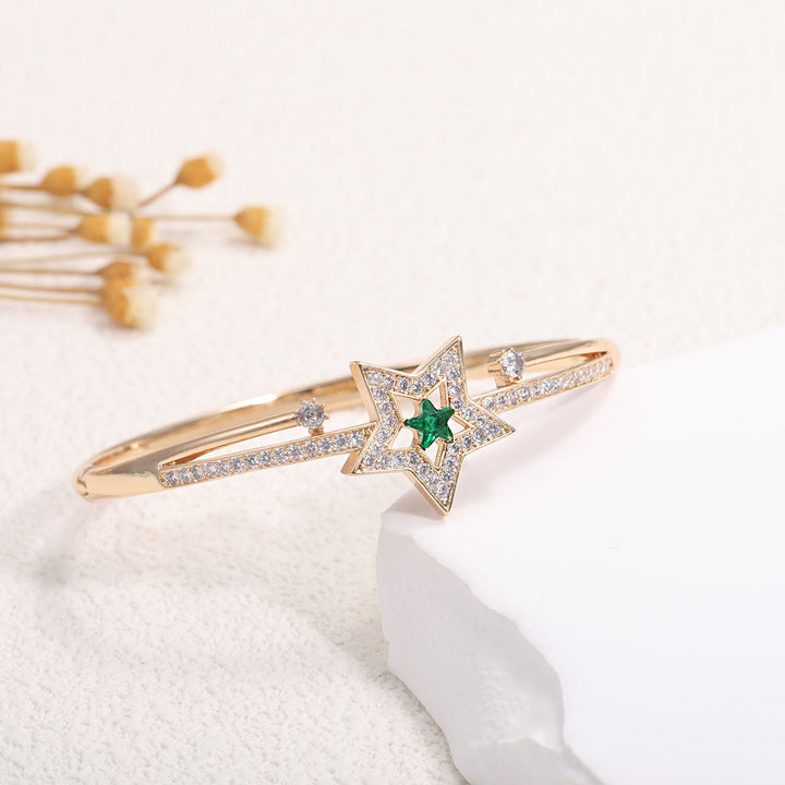 Women's bangle with elegant infinity pattern and sparkling zirconia Tom Cottons