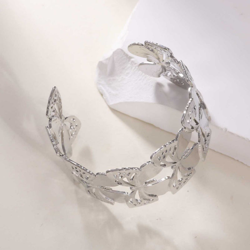 Women's Open Bangle with Elegant Wave Design Tom Cottons