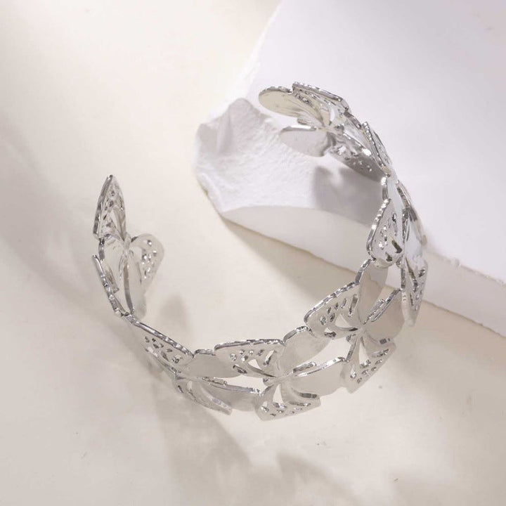 Women's Open Bangle with Elegant Wave Design Tom Cottons