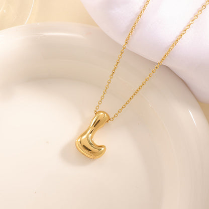 Women's necklace with curved letter pendant Tom Cottons