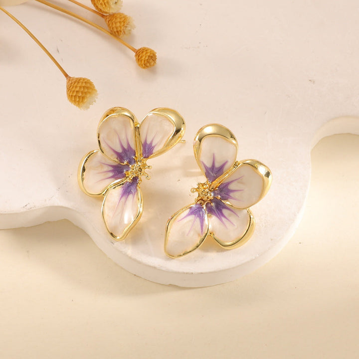 Women's ear clips in elegant floral design with a glossy coating Tom Cottons