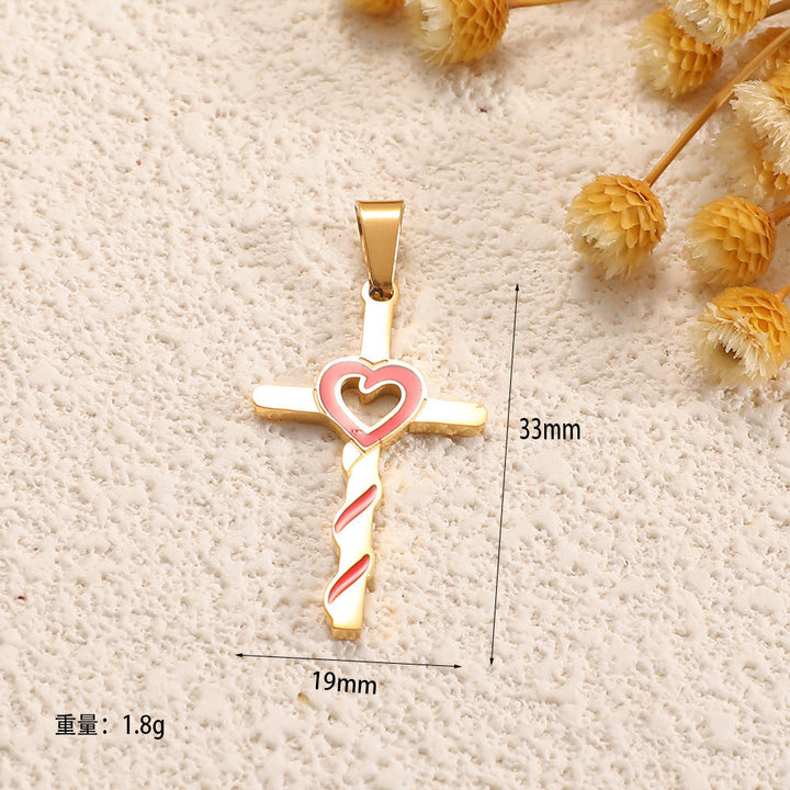 Ladies cross pendant with heart-shaped design and sparkling accents Tom Cottons