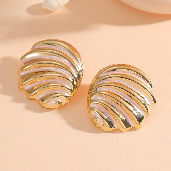 Women's ear clips in maritime shell design Tom Cottons