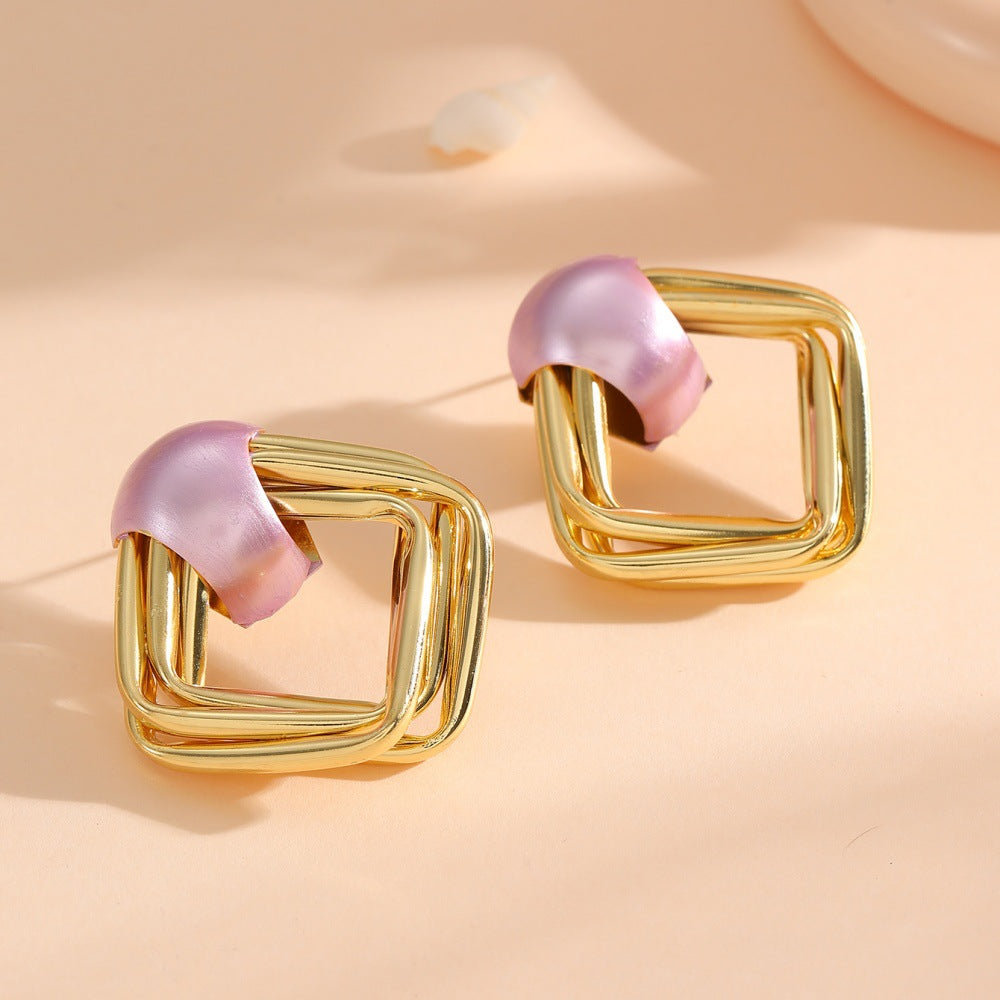Women modern earrings with asymmetrical design Tom Cottons