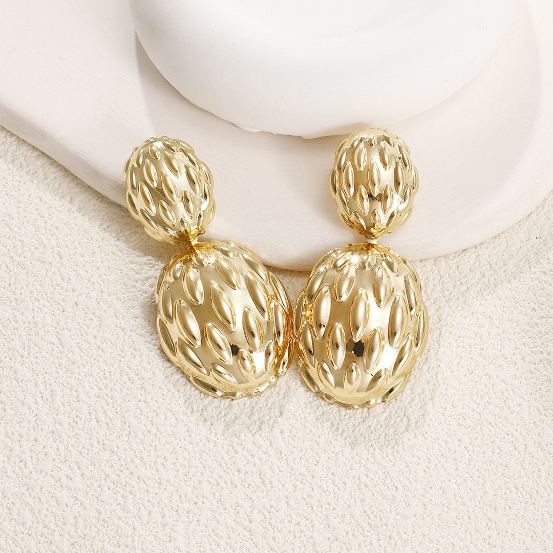 Women's earrings in artistic, structured design Tom Cottons